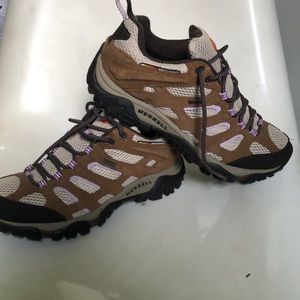 Merrell continuum low hikers with purple accents. Very dependable.